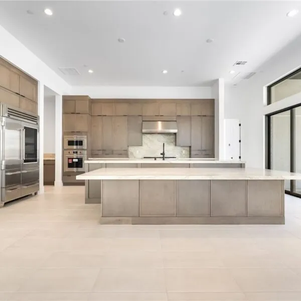 image of kitchen design with glass door going outside