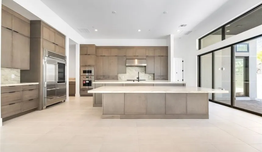 image of kitchen design with glass door going outside