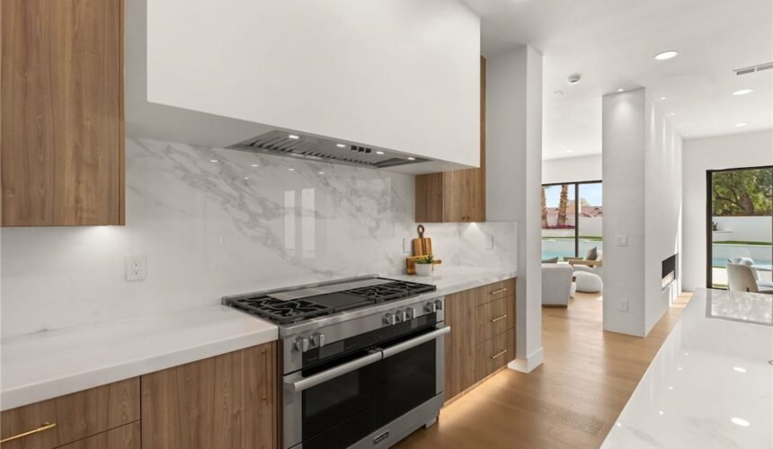 image of cabinet and stove in kitchen
