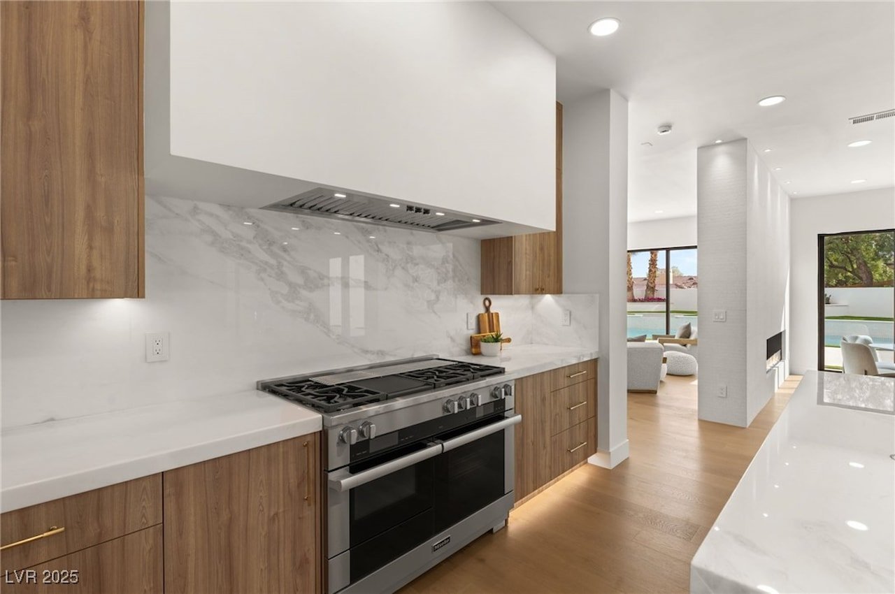 image of cabinet and stove in kitchen