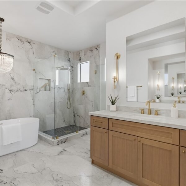 image of bathroom with bathtub with big mirror