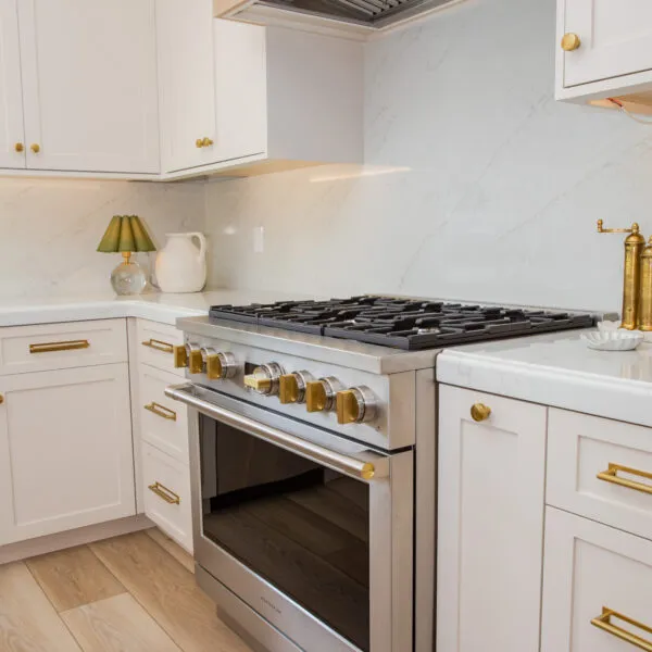 image of stove and cabinets in kitchen