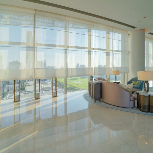 Inside of modern hotel lobby, entrance and reception, waiting area with urban city view of outdoor, indoor.